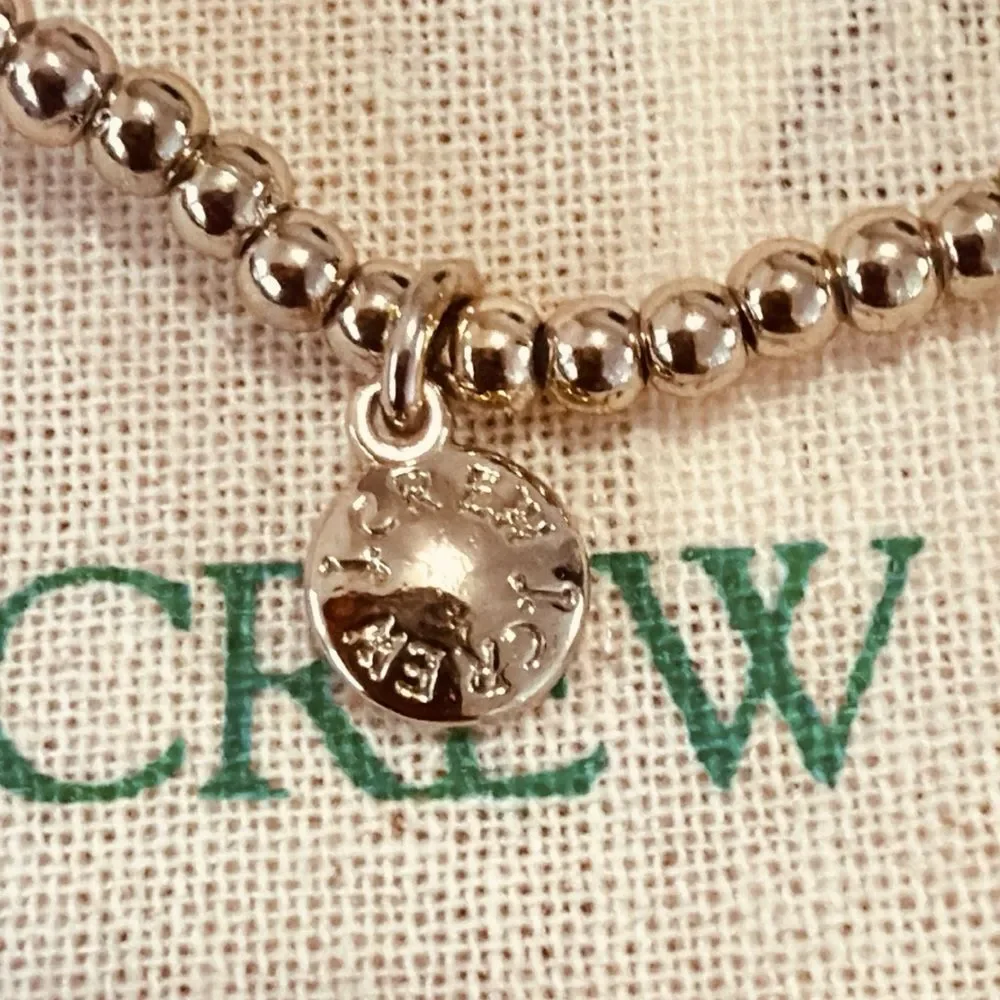 J.crew beaded stretch bracelet with dainty cubic zirconia charm